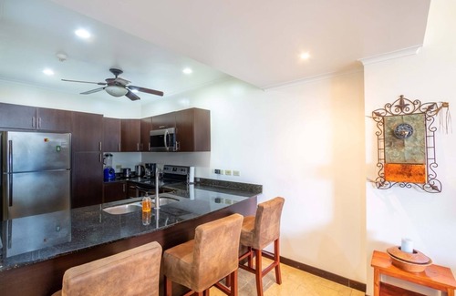 Barrio Los Faroles Condo | Oceanfront Beachfront condo The Palms Jacó Beach Vacation Rental 102 Costa Rica