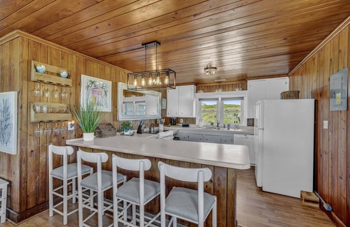 Surf City Cottage | Oceanfront Charm | Classic 1960s Cottage | Screened Porch & Extra Suite