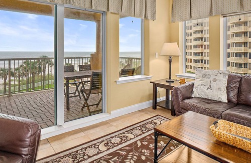 New Smyrna Beach Condo | Oceanfront condo with balcony, sunrise views, WiFi & on-site pool/fitness center