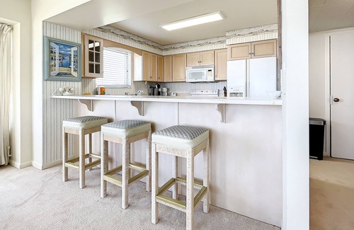 New Smyrna Beach Condo | Oceanfront condo with balcony, pool, & central AC - snowbird-friendly