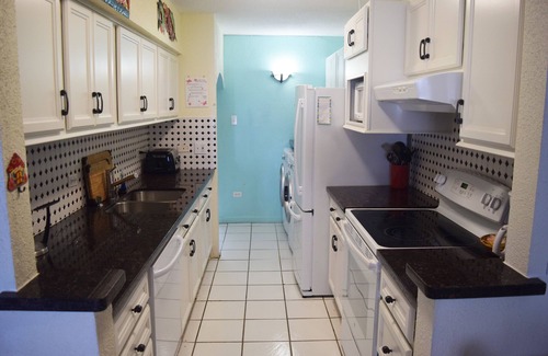 Estate Golden Rock Condo | Oceanfront Condo - Four Steps to Beautiful Sugar Beach