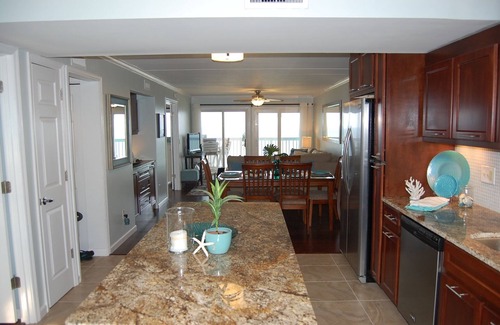 South Nags Head Condo | Oceanfront condo in OBX Fully Renovated 2 Bedroom, 2 Bath Condo On The Beach