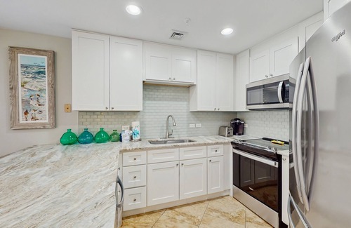 North Forest Beach Condo | Oceanfront condo with pools, hot tubs, WiFi, washer/dryer, & central A/C