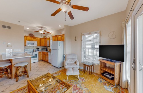 Hatteras Condo | Oceanfront condo with private balcony, hot tub, outdoor pool, & pool table