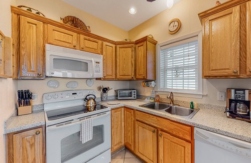Hatteras Condo | Oceanfront condo with private balcony, hot tub, outdoor pool, & pool table