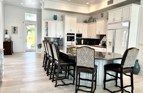 Sandy Point Villa | Oceanfront Dream Villa. Expansive pool, game room, rooftop lounge, kitchen.