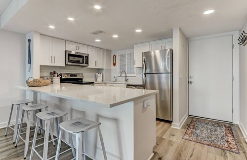 Fernandina Beach Condo | Oceanfront Elegance: Your Coastal Haven