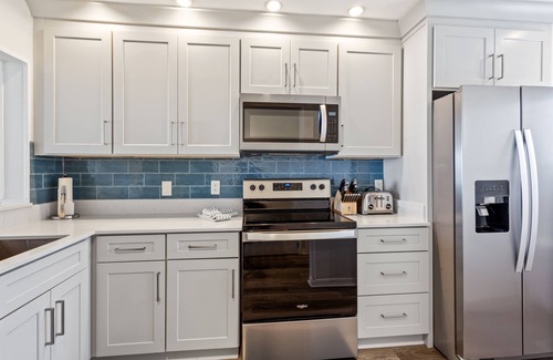 Crescent Beach Condo | Oceanfront family friendly condo with Pool, Playground, Tennis + Private Balcony