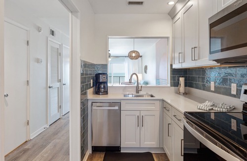 Crescent Beach Condo | Oceanfront family friendly condo with Pool, Playground, Tennis + Private Balcony