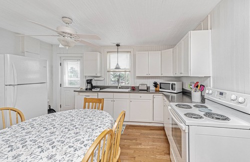 Folly Beach House | Oceanfront Getaway - Private Boardwalk, Enclosed sun porch
