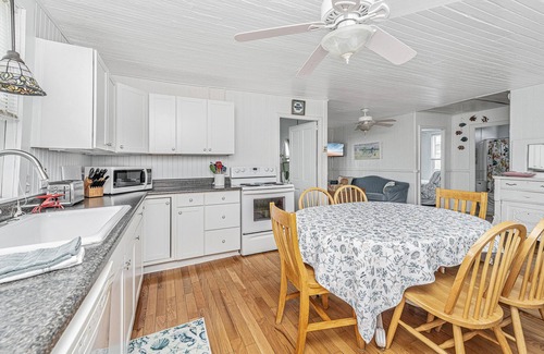 Folly Beach House | Oceanfront Getaway - Private Boardwalk, Enclosed sun porch