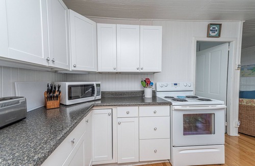 Folly Beach House | Oceanfront Getaway - Private Boardwalk, Enclosed sun porch