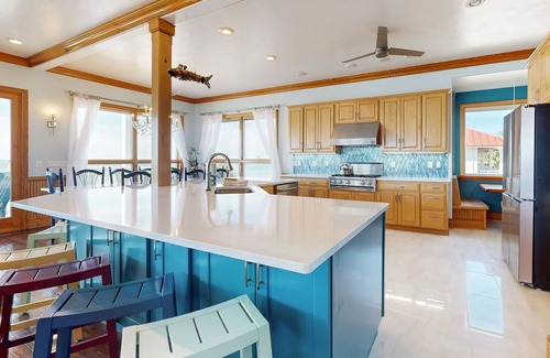 Plantation House | Oceanfront home with private dock & rooftop deck - pool, hot tub & tennis access