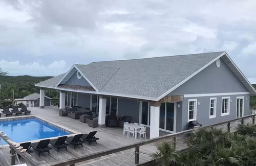 Forbes Hill House | Oceanfront home! 7 Bdrm Beachfront Villa, heated Pool, 2bedroom cottage