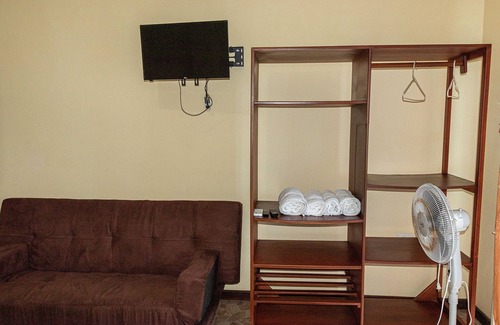 Coastal Region Hotel | Oceanfront Hostel - Balcony with amazing ocean sunset views, pool and Steam Room