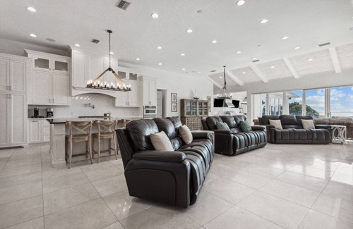 Fernandina Beach House | Oceanfront | Luxury Beachfront Home | Wall to Wall Folding Glass Doors Opening to Private Pool Deck