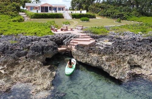West Bay House | Oceanfront Oasis Home with cottage & pool