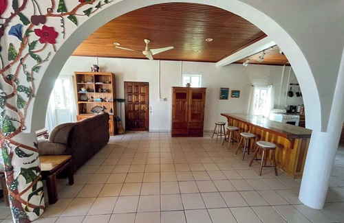 Santa Cruz House | Oceanfront Paradise with Stunning Mosaic Art, Pool & Rooftop Deck