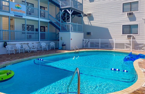 Crescent Beach Condo | Oceanfront retreat with a scenic balcony, W/D, and AC - beach and pool access