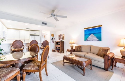 Rum Point Condo | Oceanfront right next to RumPoint, tranquility,pool,gym,tennis court and sunsets