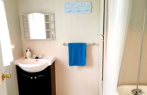 Dalhousie House | Oceanside bungalow next to a lighthouse, minutes walk to the beach!
