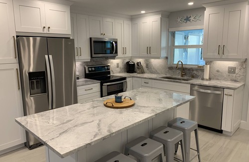 Key Largo House | Oceanside Key Largo Townhome, Private Marina, pools, Tennis and Golf Cart