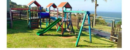 Shaka's Rock Apartment | Oceanview Oasis SEAVIEW - PRIVATE BRAAI - 9 HOLE PUTT-PUTT - TENNIS