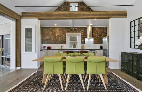 Moss Vale House | Old Bank Stables – north facing sun patio, outdoor furniture and BBQ