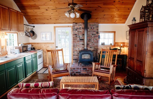 Olga Cottage | Old Island Charm with Stunning Mountain Views, Perched above Our Private Beach