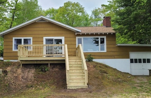Cadillac Cottage | Ole’s Little Cove Cottage, waterfront, close to snowmobile & side by side trails