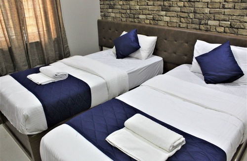Madiwala Hotel | Olivia Inn And Suites
