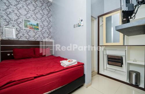 Malang Hotel | Omah Kalimosodo Mitra RedDoorz near Stasiun Malang Kota Baru