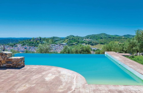 Constantina House | On a small hill in the mountains of Constantina, you will find this lovely vacation finca with a spe