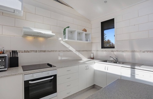 Merimbula Apartment | On the lake at Penguin Mews: Ground floor pet friendly