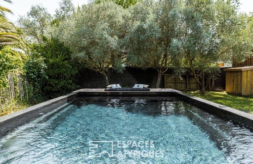 La Cotiniere Apartment | On the West Coast of the Ile D'Oléron, 200 meters from the ocean and 600 meters from the famous port of La Cotinière, this wood-clad villa is a true refuge of calm, gentleness and hospitality, in the calm of a garden with a garden of trees.