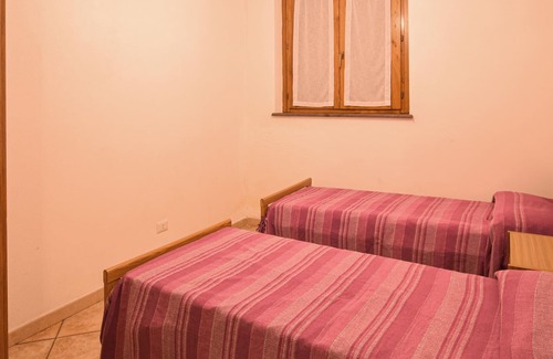 Funtana Meiga Apartment | On the west coast of Sardinia welcomes you this beautiful terraced house with sea view.