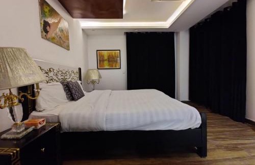 Loralai District Apartment | One Bed Appartment in GoldCrest Mall and residency DHA Lahore