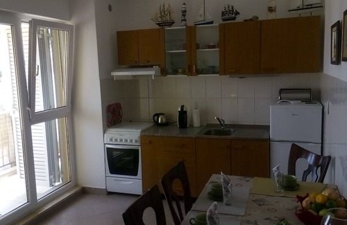 Municipality of Trogir Apartment | One bedroom apartment with balcony and sea view Mastrinka, Čiovo (A-24035-a)