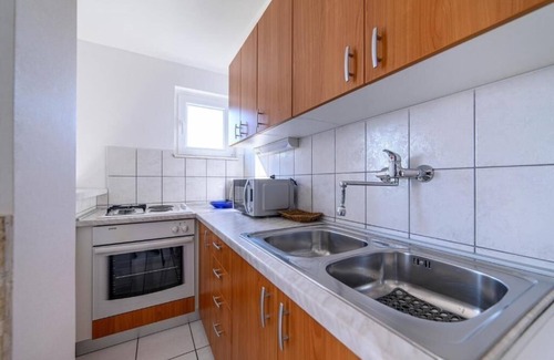 Raslina Apartment | One bedroom apartment with balcony and sea view Raslina, Krka (A-24304-a)