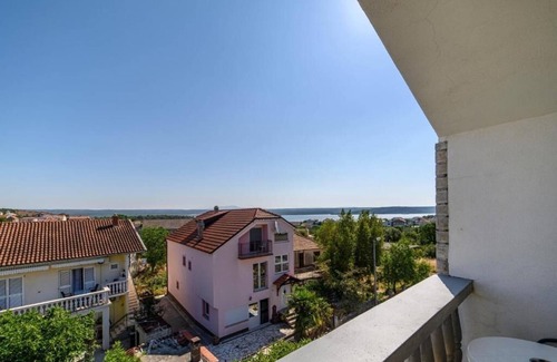 Raslina Apartment | One bedroom apartment with balcony and sea view Raslina, Krka (A-24304-a)