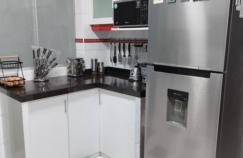 Santiago de Surco House | One-bedroom apartment with studio and private bathroom in residential area