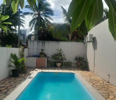 Midlands Apartment | One-bedroom beach apartment, aircon,pool,WIFI