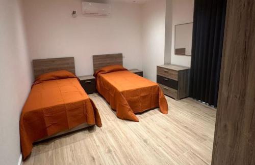Ta' Pennellu House | One Bedroom in New Apt Mellieha- Orange Room 1