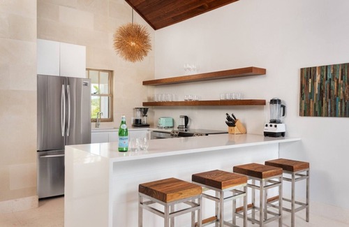 Grace Bay Villa | One Bedroom Luxury Beach Front Villa at Turtle Cove Marina - Free Concierge