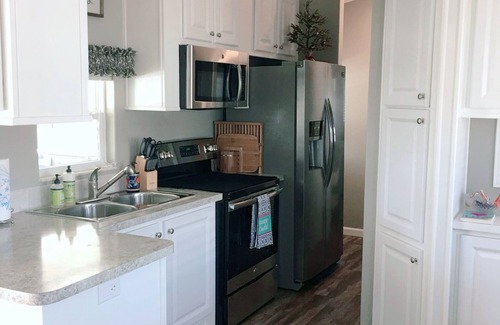 Miramar Beach Cottage | One block from Pompano Joes is our resort cottage with large patio for relaxing