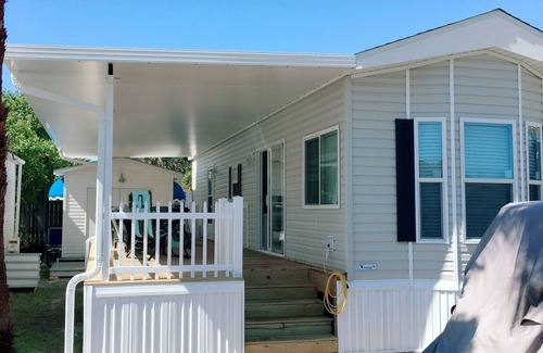 Miramar Beach Cottage | One block from Pompano Joes is our resort cottage with large patio for relaxing