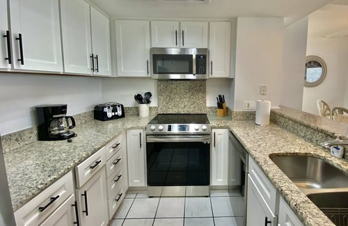 Garden City Condo | One Ocean Place , Newly renovated and spectacular 3 bedroom corner unit