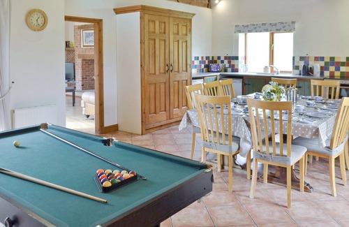 Denstone Cottage | One of two barn conversions with exposed beams and trusses.