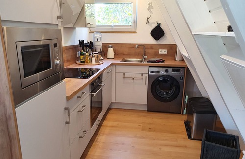 Carolinensiel House | Only roof house Murmel 5, charging station f. E-cars, WLAN, beach chair, fireplace