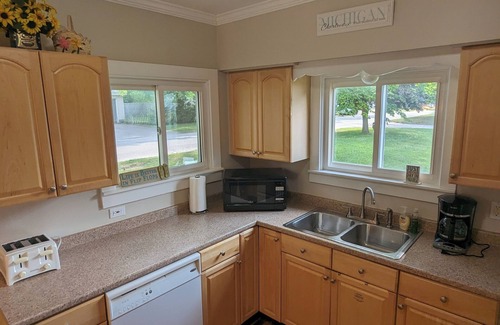 Charlevoix Cottage | Open, bright, pet-friendly cottage w/AC - walking distance to beaches & town!